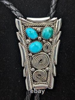 Vintage Navajo Sterling Silver High Grade Turquoise Bolo with Swirls Unsigned